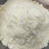 A bowl of rice is shown with the top of it.