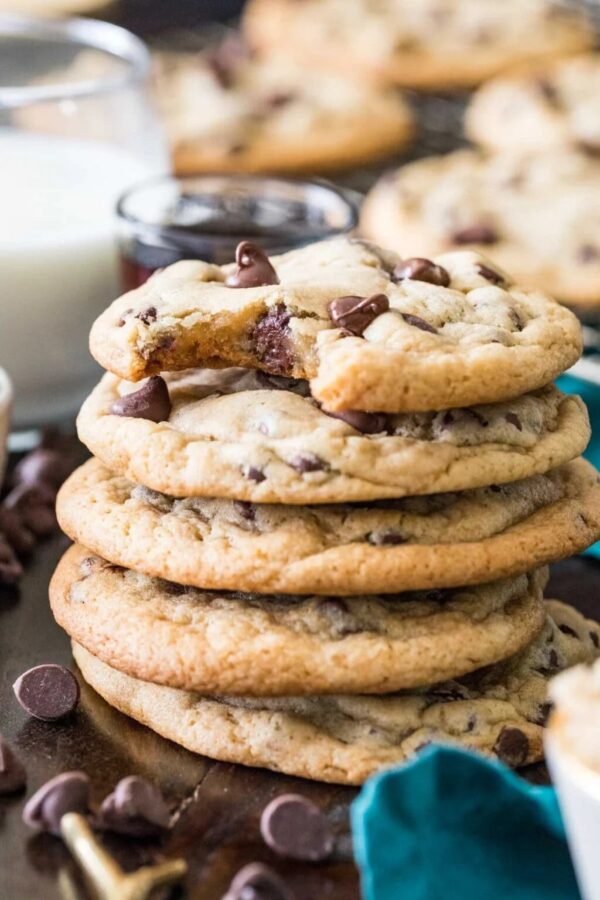 A stack of cookies with chocolate chips and peanut butter.