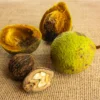 A group of fruit sitting on top of a table.