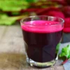 A glass of juice on the table